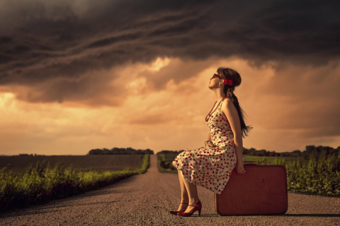 Обои Girl Sitting On Luggage On Road 480x320