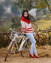 Girl On Bicycle wallpaper 176x220
