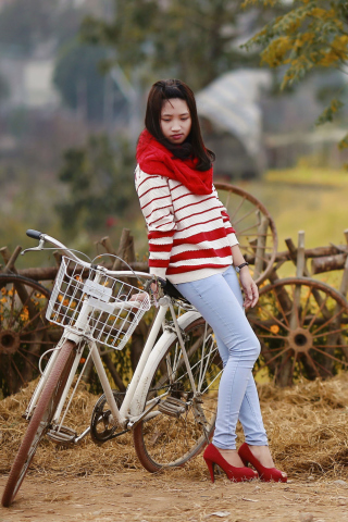 Das Girl On Bicycle Wallpaper 320x480