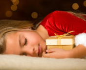 Child With Christmas Present wallpaper 176x144