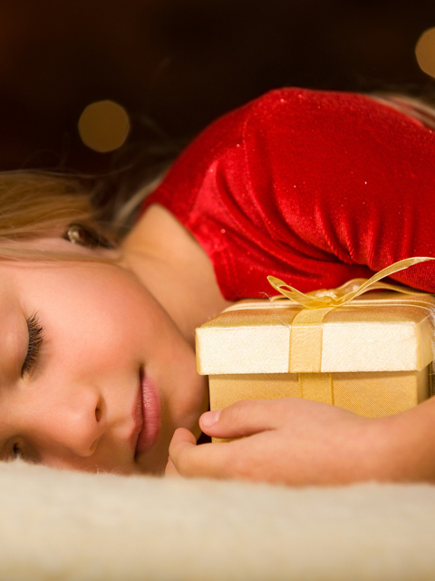 Child With Christmas Present wallpaper 480x640
