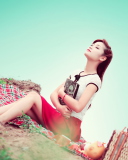 Sfondi Asian Girl Enjoying Picnic 128x160