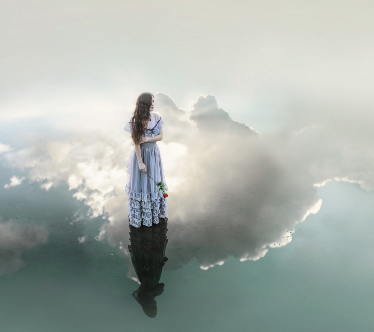 Sfondi Girl With Rose Standing On Sky 1440x1280