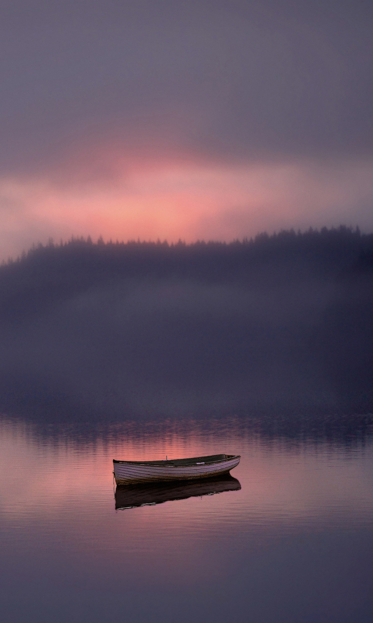 Sfondi Lonely Boat And Foggy Landscape 768x1280