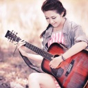 Fondo de pantalla Chinese girl with guitar 128x128