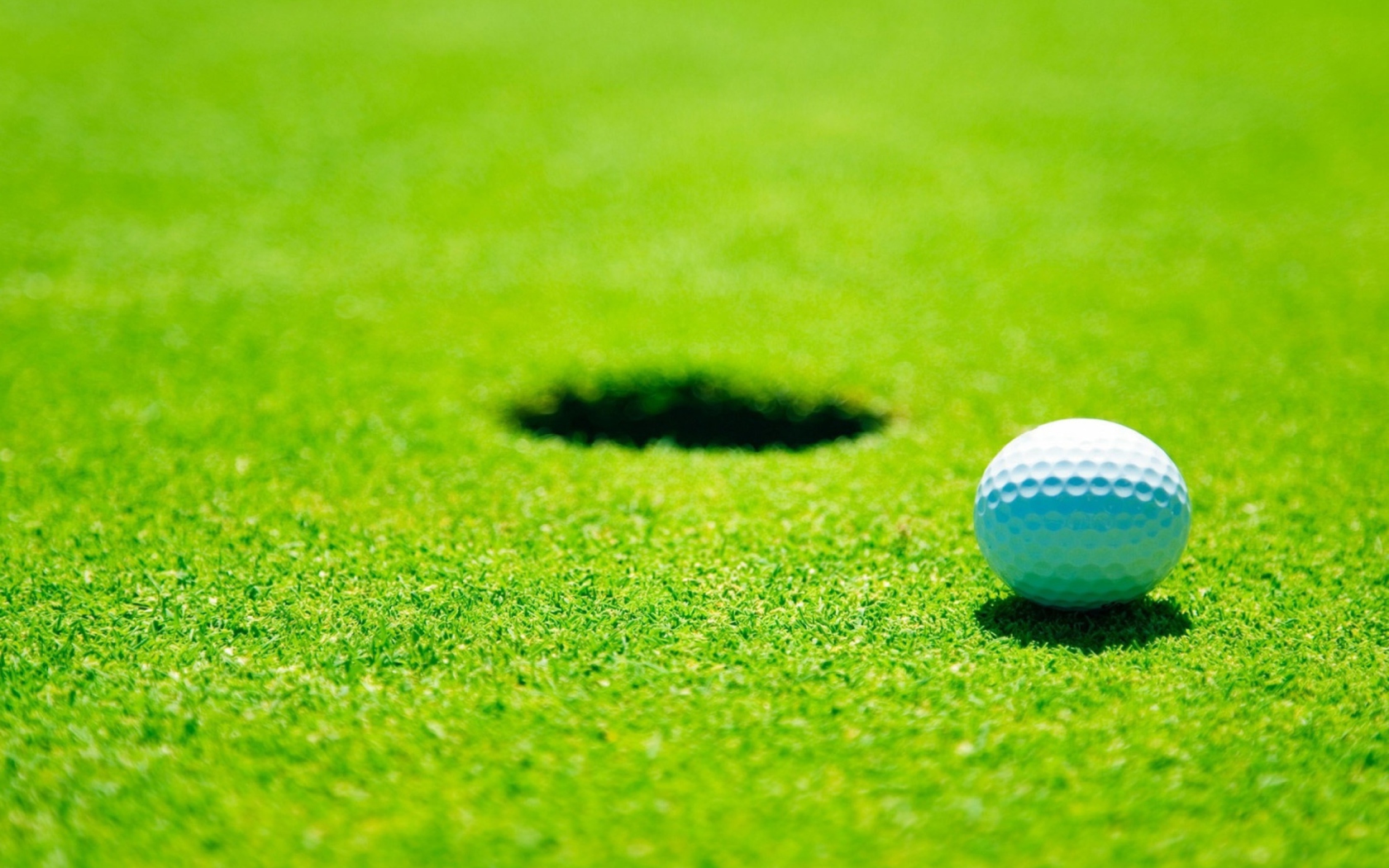 Fondo de pantalla Golf Ball 1680x1050