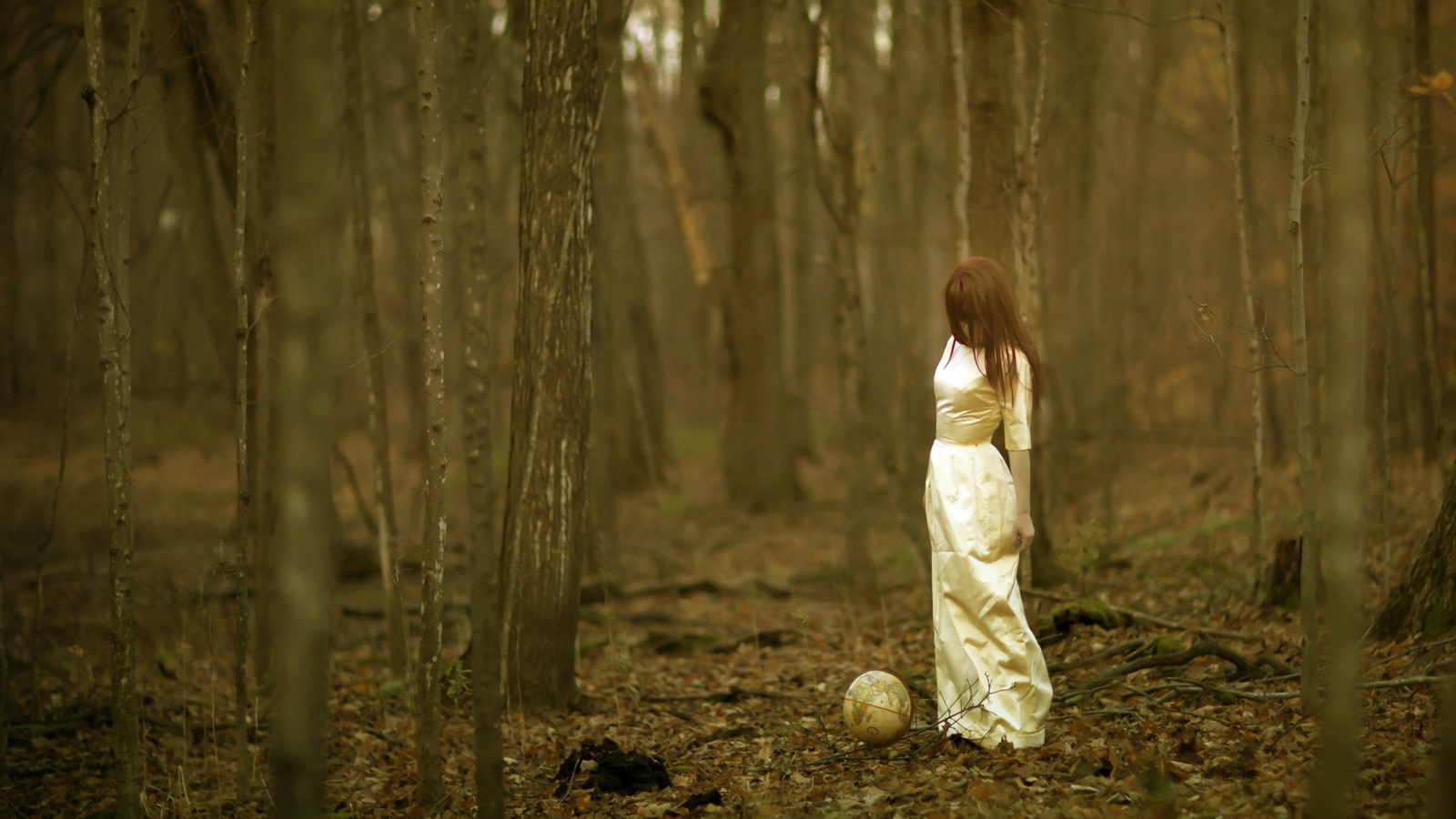 Girl And Globe In Forest wallpaper 1600x900