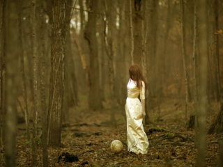 Girl And Globe In Forest wallpaper 320x240