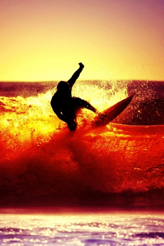 Surfing At Sunset wallpaper 320x480