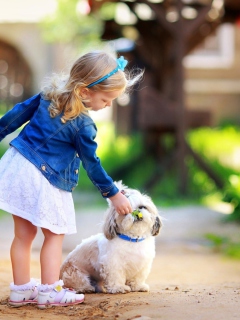Обои Little Girl With Cute Puppy 240x320