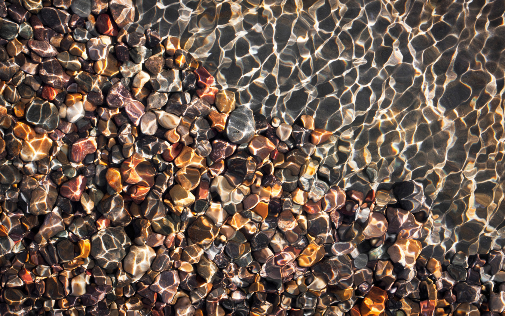 Pebbles And Water Reflections wallpaper 1680x1050