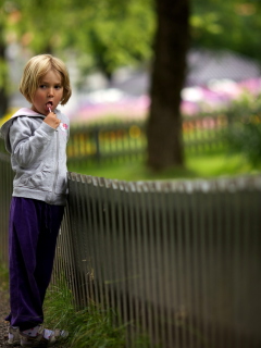 Sfondi Little Girl With Lolly 240x320