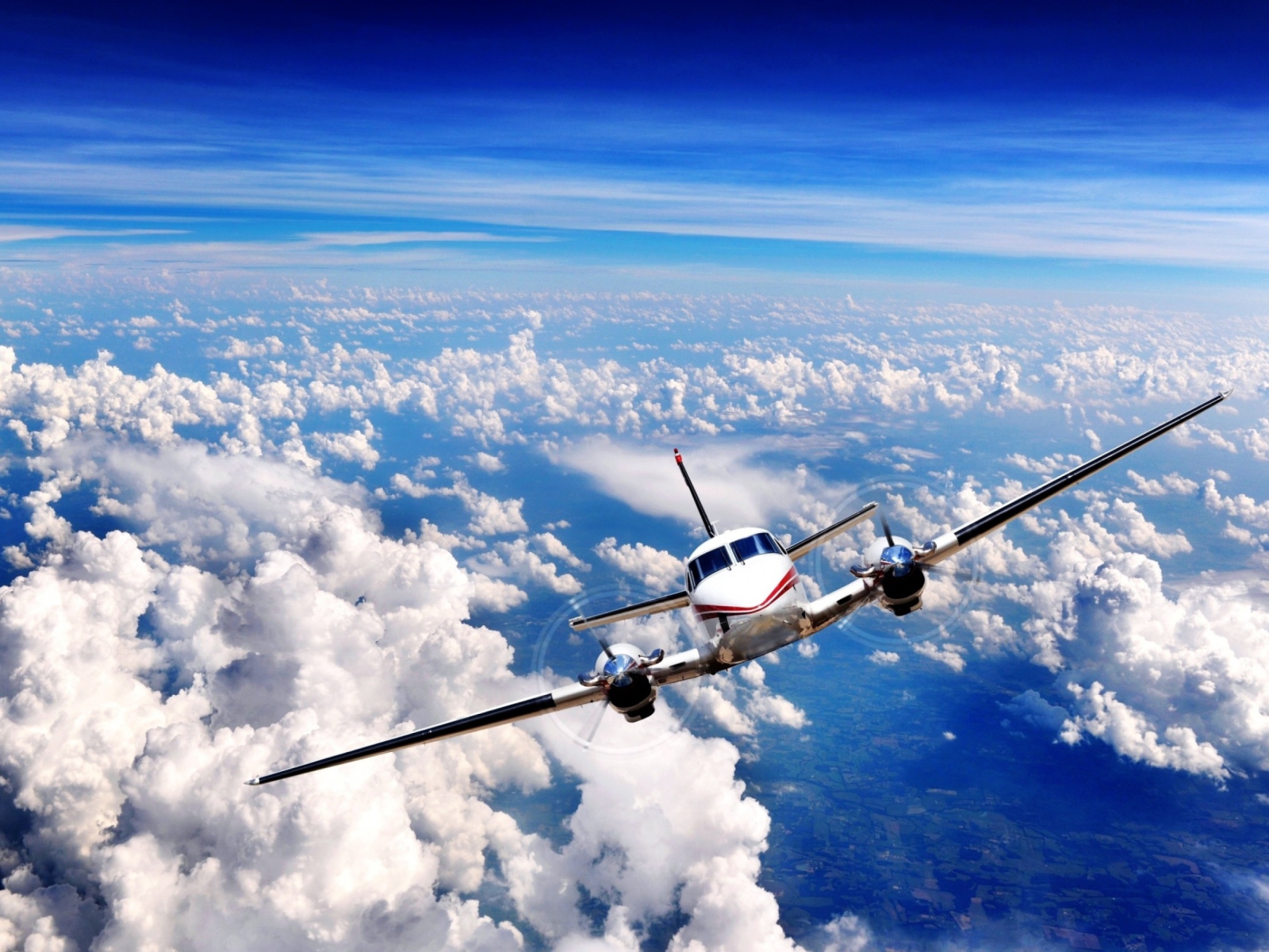 Plane Over The Clouds wallpaper 1600x1200