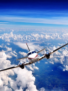 Das Plane Over The Clouds Wallpaper 240x320