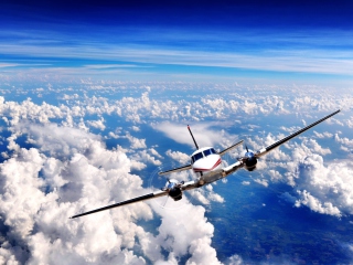 Plane Over The Clouds wallpaper 320x240
