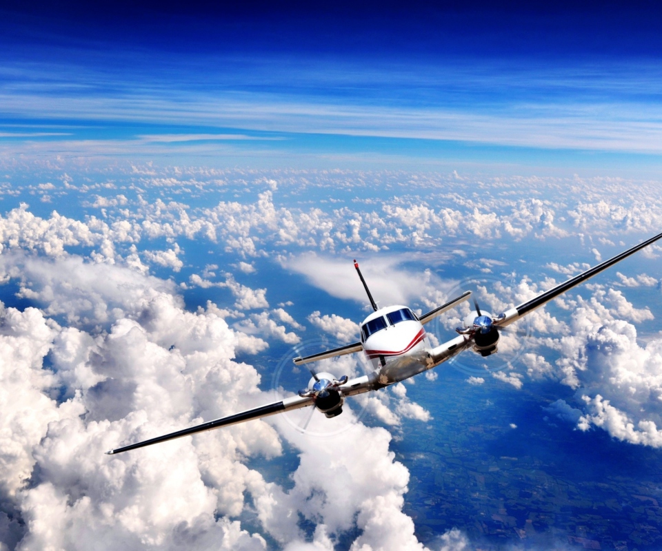 Plane Over The Clouds wallpaper 960x800