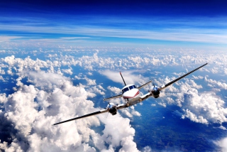 Plane Over The Clouds Background for Android, iPhone and iPad