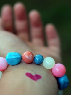 Heart And Colored Marbles Bracelet wallpaper 240x320