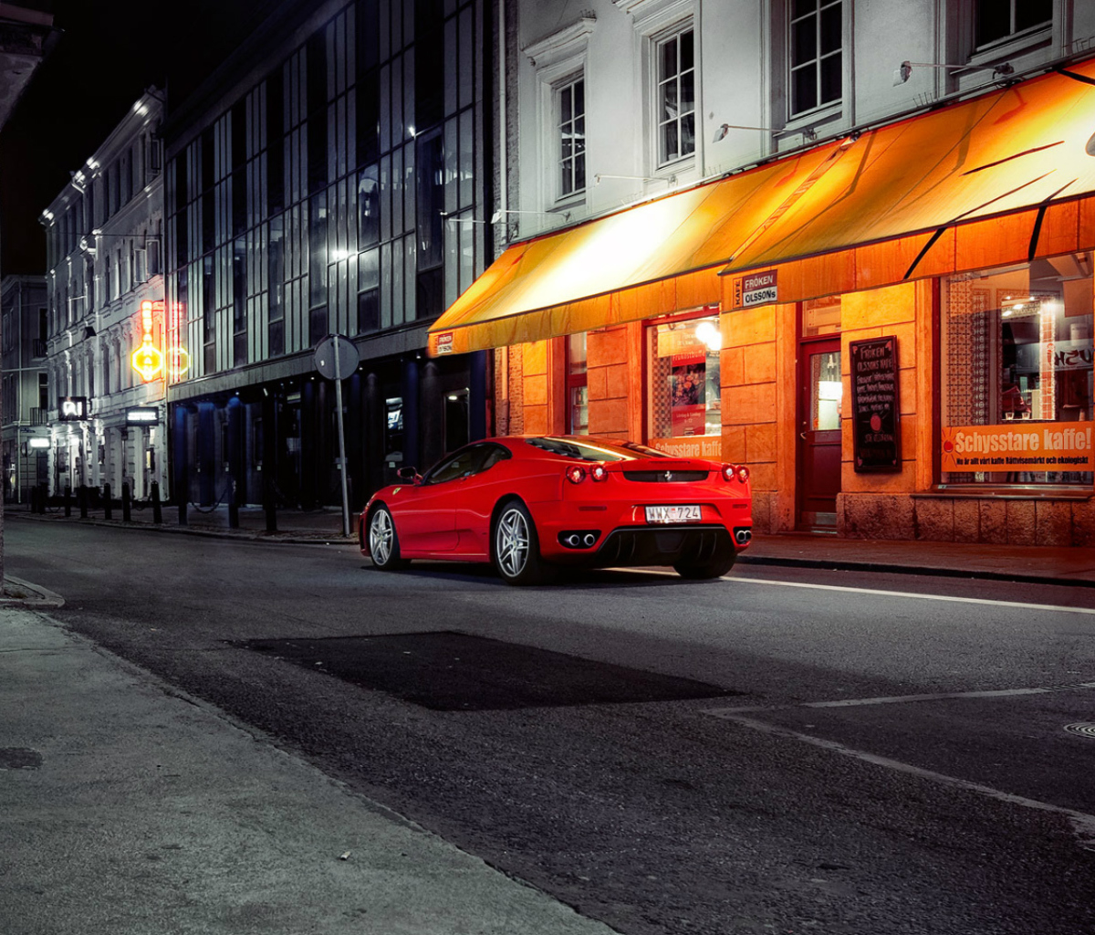 Обои Red Ferrari In City Lights 1200x1024