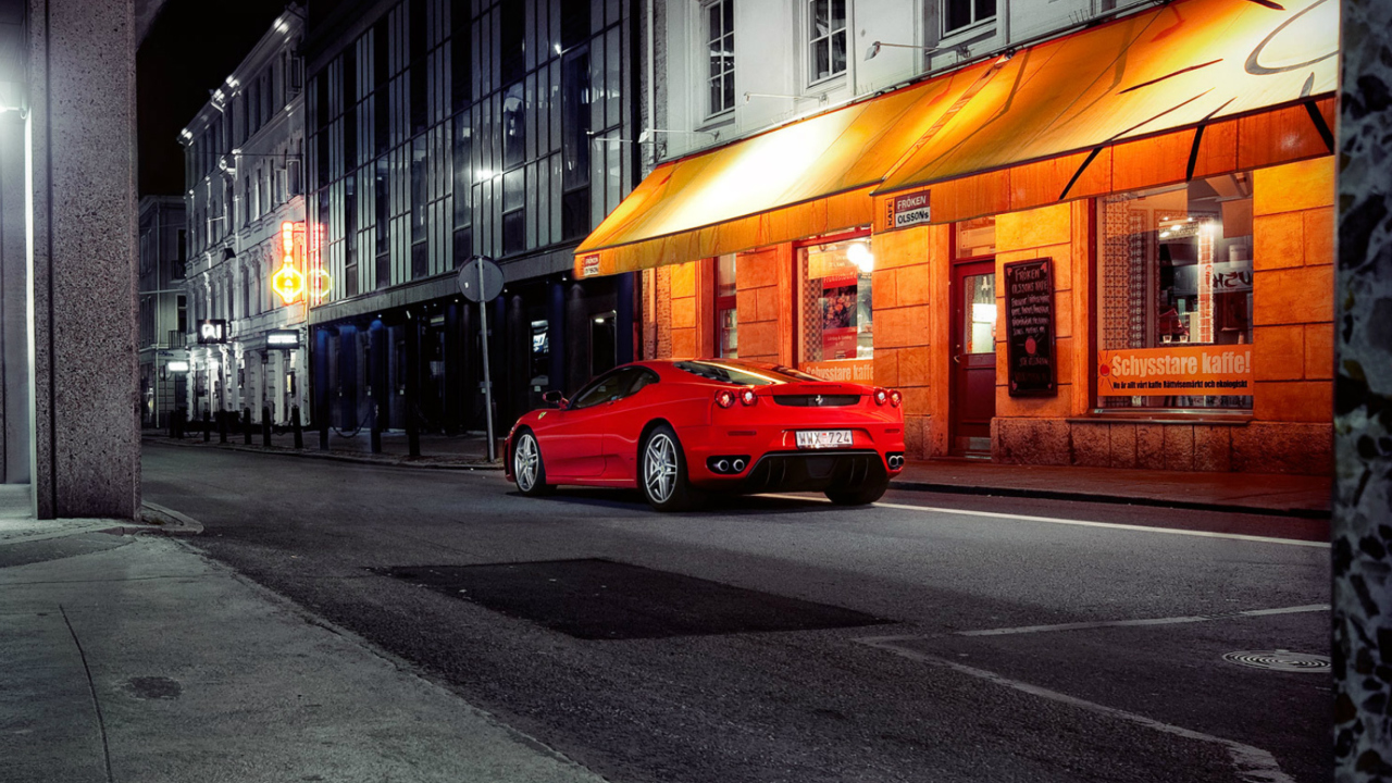Red Ferrari In City Lights wallpaper 1280x720