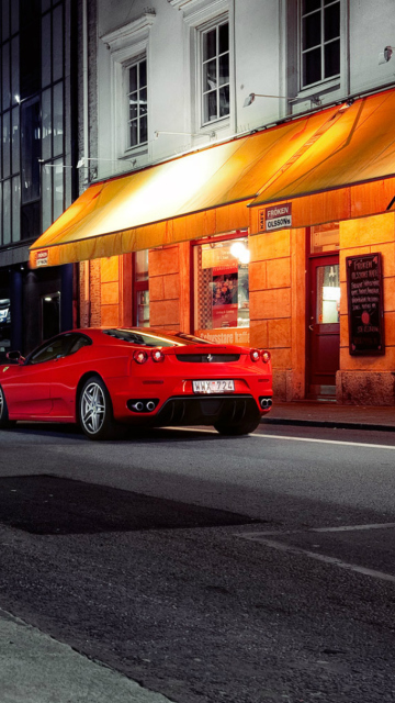 Sfondi Red Ferrari In City Lights 360x640