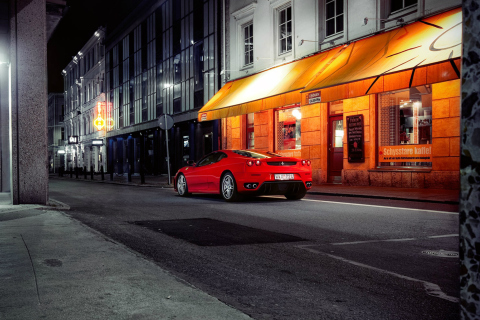 Sfondi Red Ferrari In City Lights 480x320