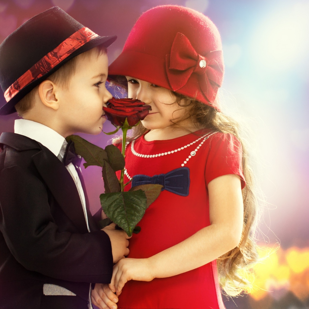 Cute Kids Couple With Rose wallpaper 1024x1024
