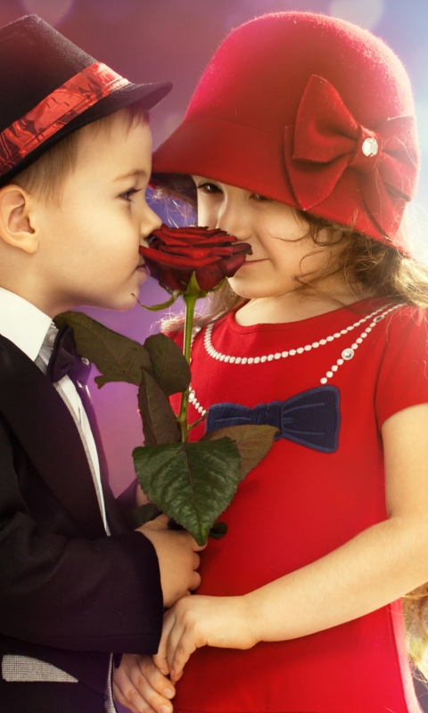 Cute Kids Couple With Rose wallpaper 480x800