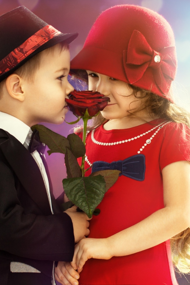 Das Cute Kids Couple With Rose Wallpaper 640x960