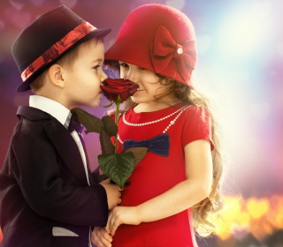 Kostenloses Cute Kids Couple With Rose Wallpaper für Samsung E1150