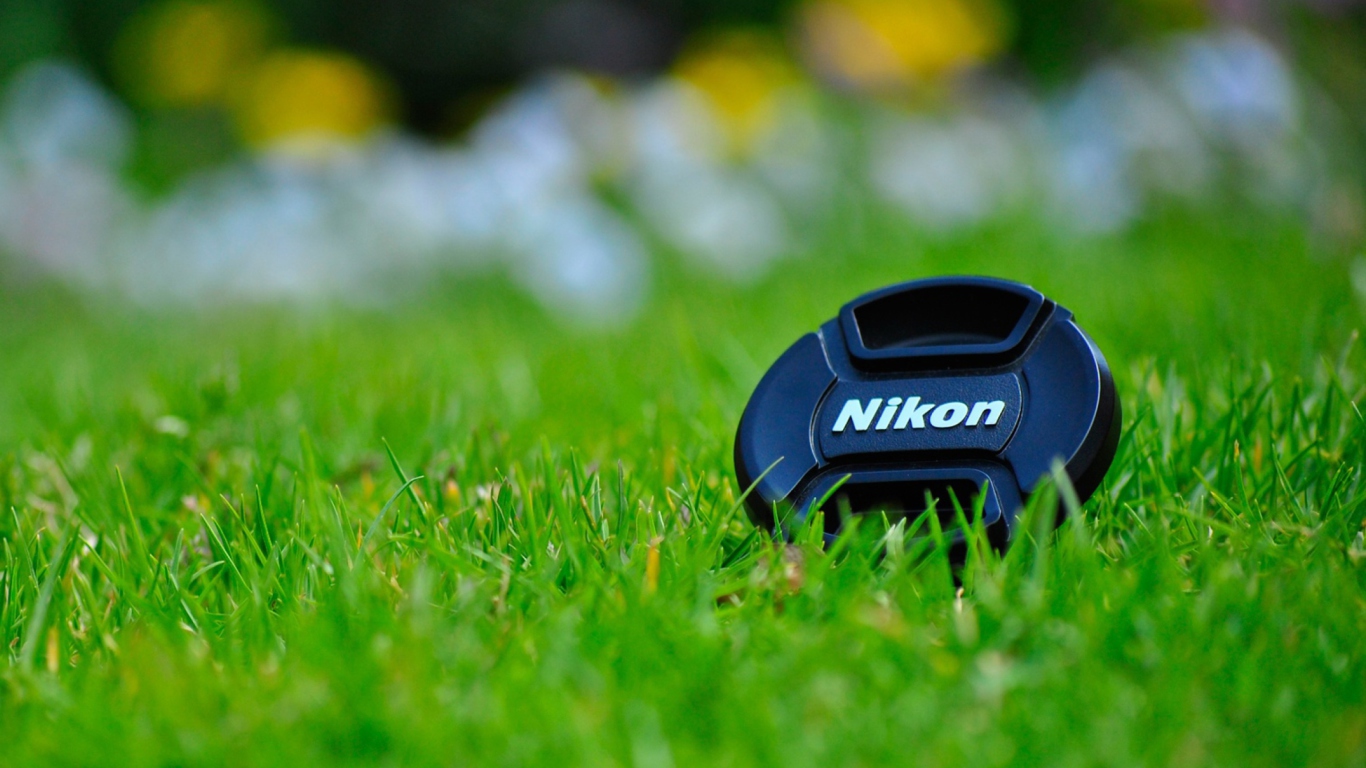 Sfondi Nikon Lense Cap 1366x768