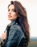 Beautiful Brunette Wearing Black Leather Jacket wallpaper 128x160