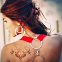 Das Girl With Tattoo On Her Back Wallpaper 128x128