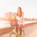 Das Girl On Bicycle In Sun Lights Wallpaper 128x128