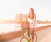 Girl On Bicycle In Sun Lights screenshot #1 176x144