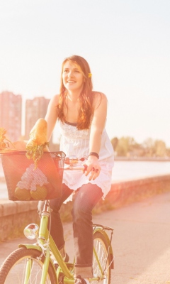 Girl On Bicycle In Sun Lights wallpaper 240x400
