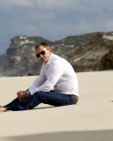 Daniel Craig On Beach wallpaper 128x160