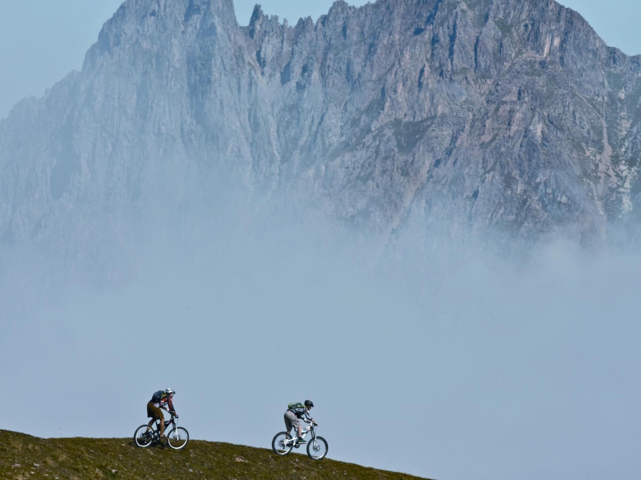 Обои Bicycle Riding In Alps Mountains 1280x960