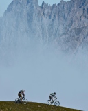 Обои Bicycle Riding In Alps Mountains 128x160