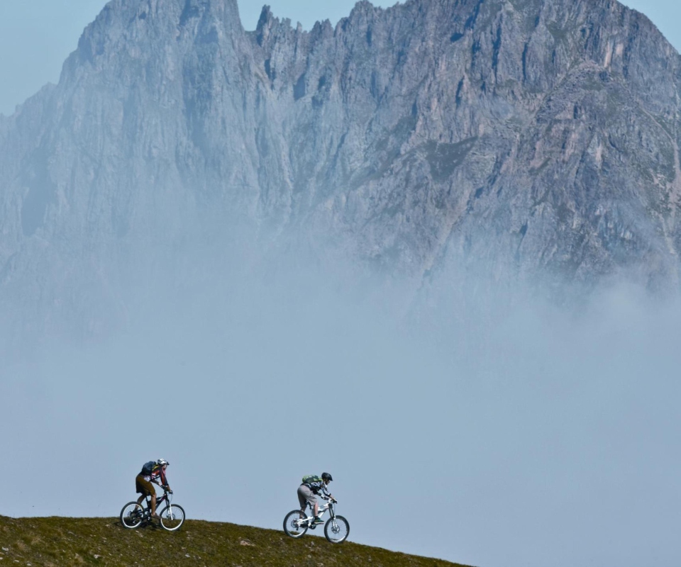Bicycle Riding In Alps Mountains wallpaper 960x800
