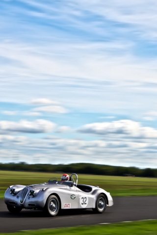 Silver Jaguar XK120 wallpaper 320x480