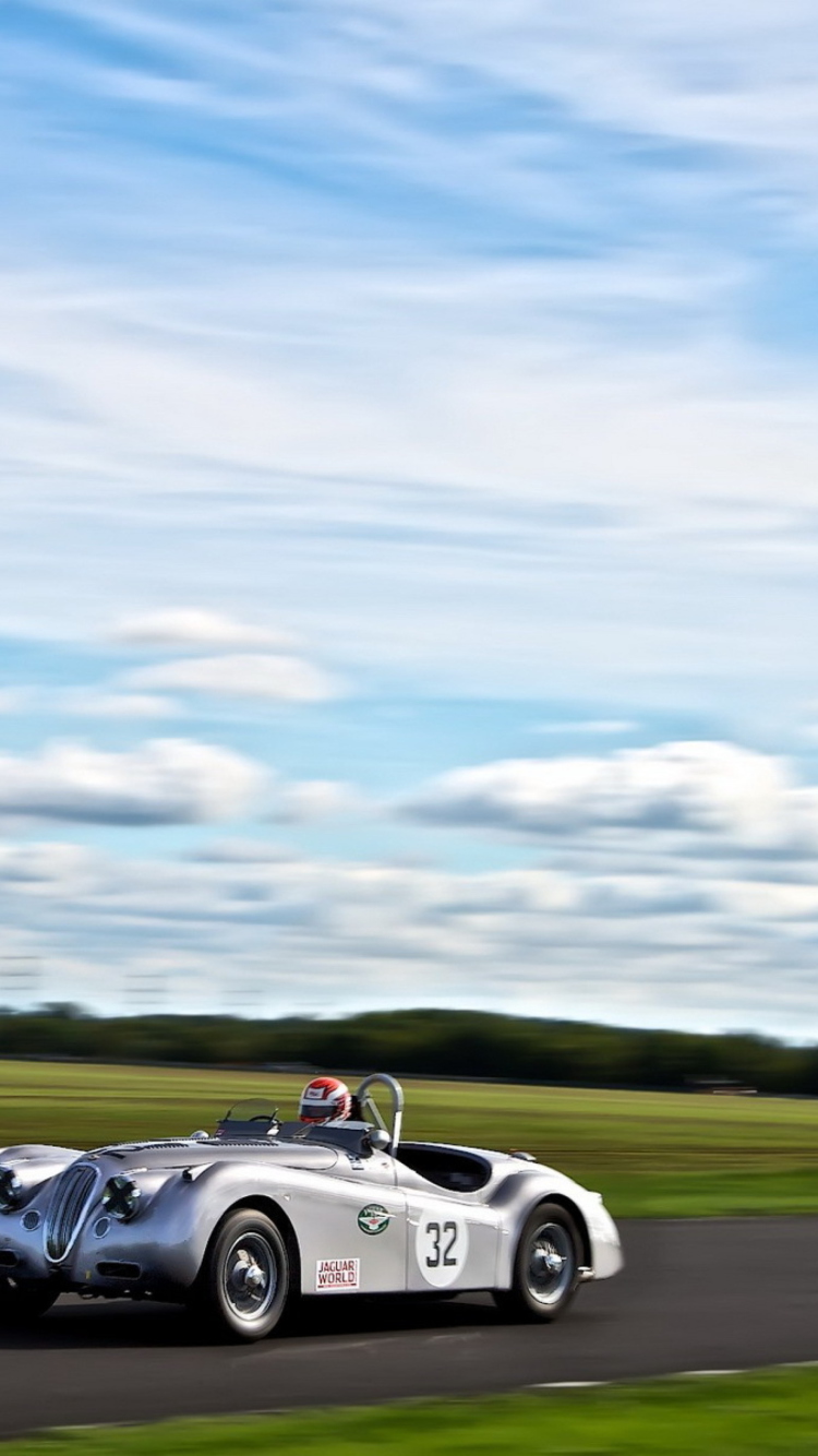 Silver Jaguar XK120 wallpaper 750x1334