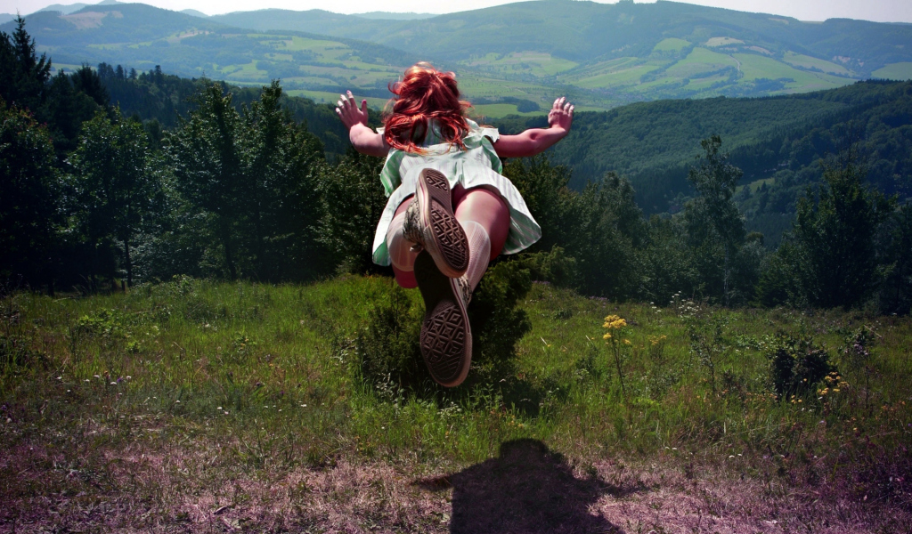 Girl Jumping And Flying wallpaper 1024x600