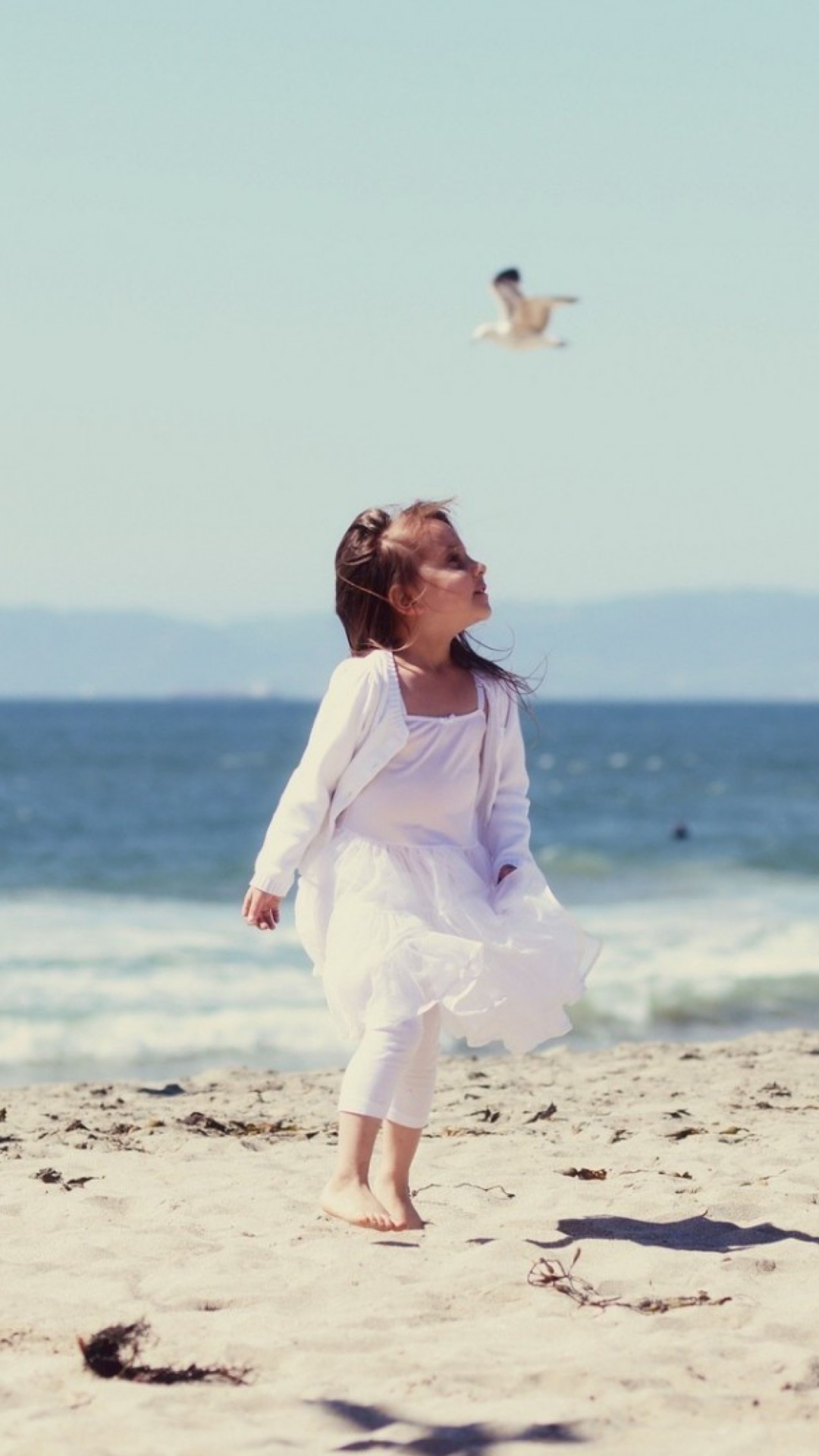 Little Girl And Seagulls On Beach screenshot #1 1080x1920