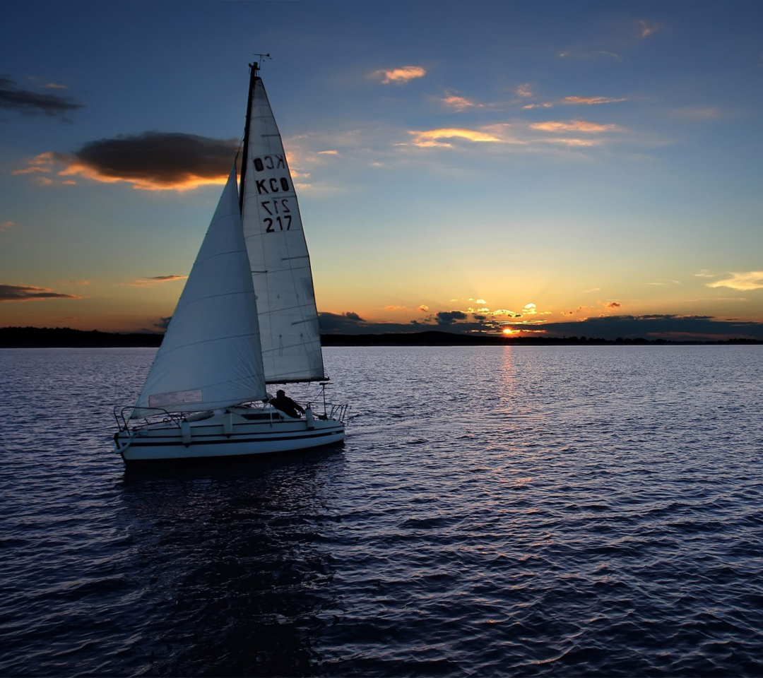 Обои Sailboat At Sunset 1080x960