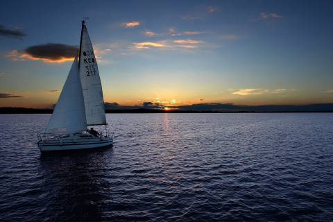 Обои Sailboat At Sunset 480x320