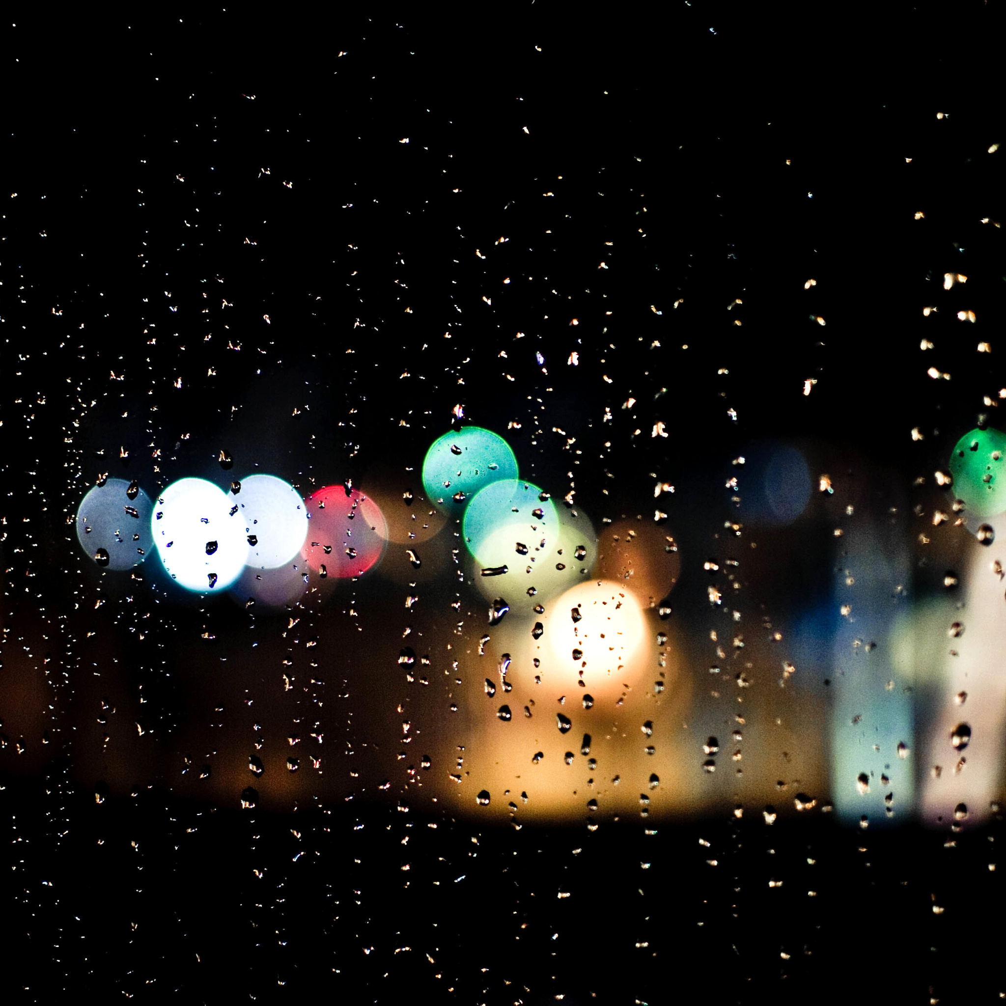 Raindrops on Window Bokeh Photo wallpaper 2048x2048