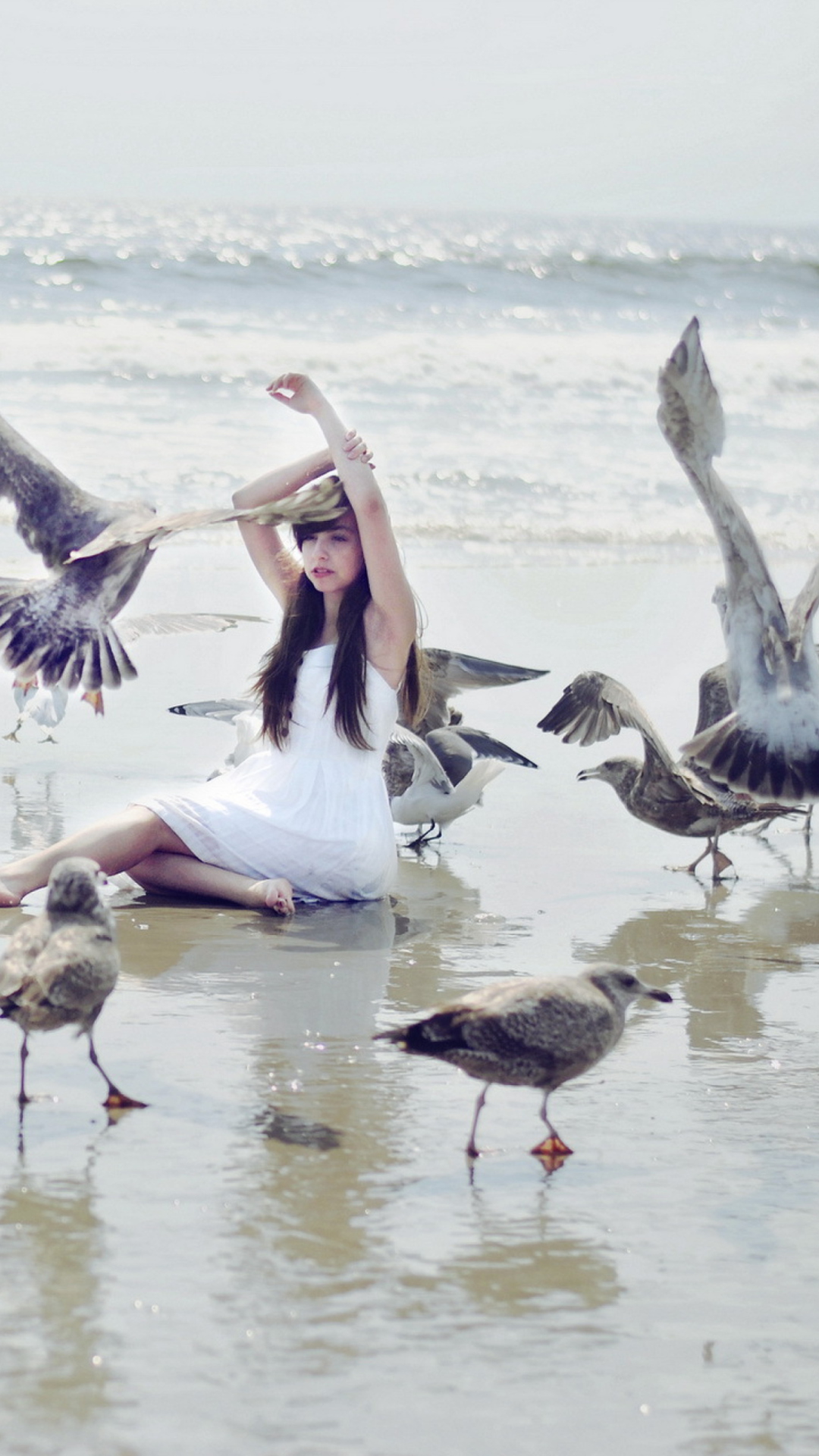 Sfondi Girl And Birds At Sea Coast 1080x1920