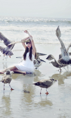 Обои Girl And Birds At Sea Coast 240x400