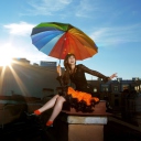 Fondo de pantalla Happy Girl With Rainbow Umbrella 128x128